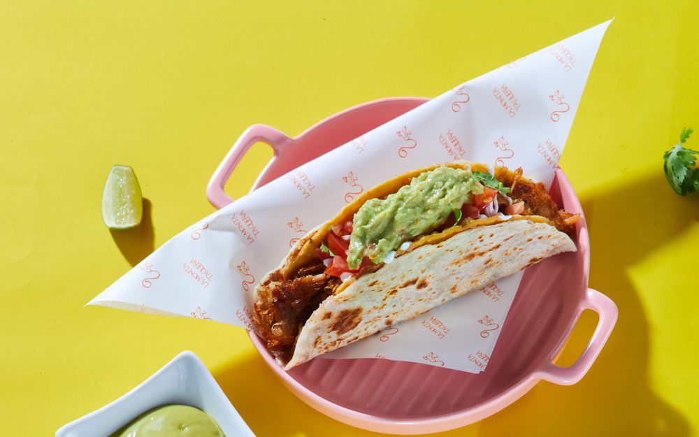 Crispy corn tortilla wrapped in soft flour